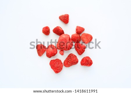 Freeze-dried strawberries isolated on white background.