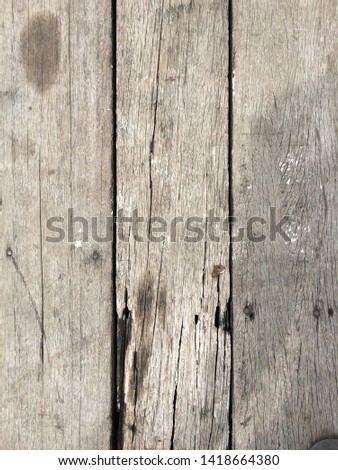 old wooden planks background with old holes