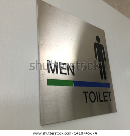 Men toilet sign on a toilet door