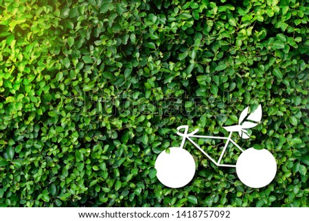 Eco bike, natural green background - Concept of global warming and saving money
