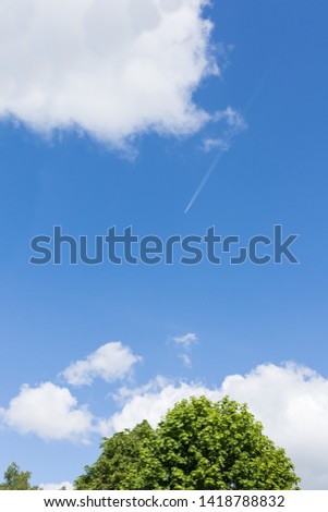 Blue sky with white clouds. Texture background for design.