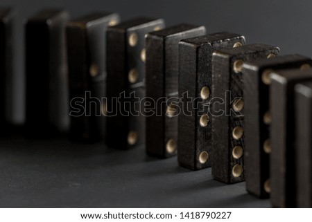 Domino formed in different ways, black, on white background. Each piece with some shade. Game of the domino.