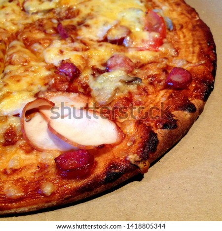 Macro Photo food fresh hot pizza. Texture background round pizza with cheese, tomatoes and bacon. Image of food is delicious pizza in box.