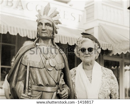 Vintage photo of a Cigar Store Indian With an Old Lady