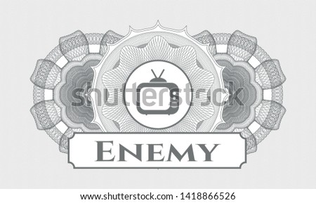 Grey passport style rosette with old tv, television icon and Enemy text inside