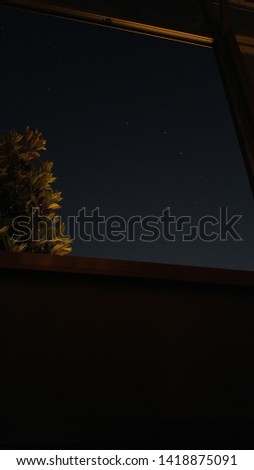 Sky and stars outside window