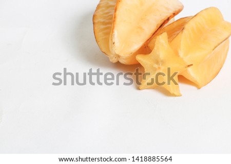 slice ripe star fruit carambola or star apple ( starfruit ) on white background healthy fruit food isolated