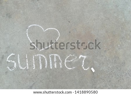 Summer word and heart - white chalk hand drawing on grey asphalt. banner with space for text