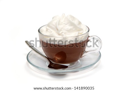 Hot chocolate with cream in glass cup