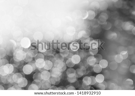 Abstract bokeh from rain drop and dew with sun shine reflection Royalty-Free Stock Photo #1418932910
