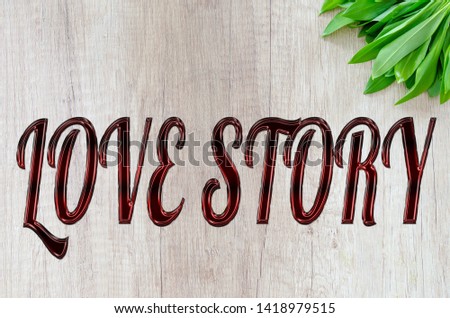 wood background with love story latter for sad people with leaf on wood background, top view