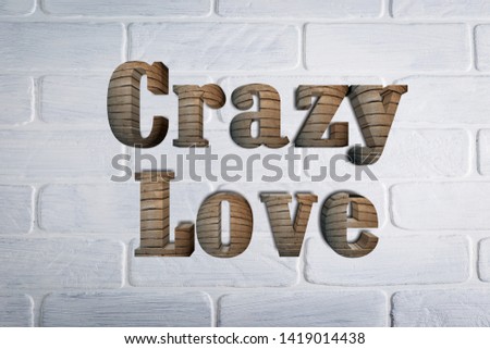 crazy love massage, latter card on white wall background, top view
