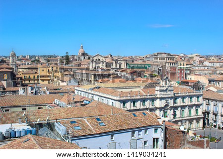 Amazing view of historical city Catania, Sicily, Italy taken from above from roofs of historical buildings in the old town. The city is a popular tourist destination.