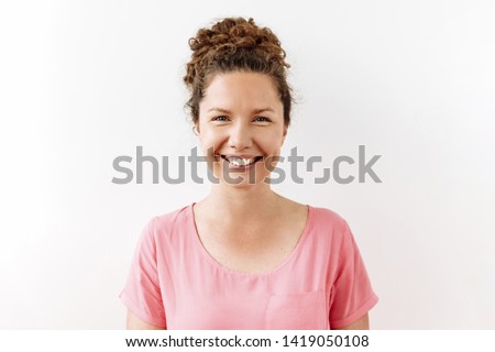 30 years curly woman portrait against white background. Laughter and joy emotions Royalty-Free Stock Photo #1419050108