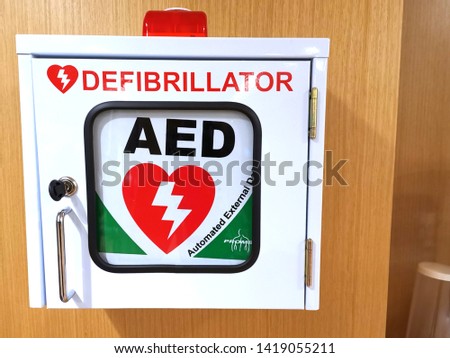 AED defibrillator kit on the wall. 