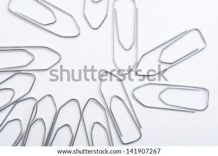 paper clips on white table