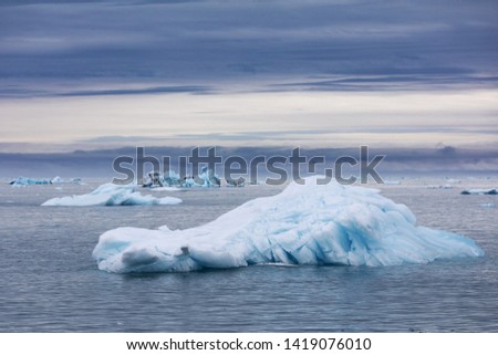 Svalbard and its nature. Iceberg in the water. Part Nordaustlandet.