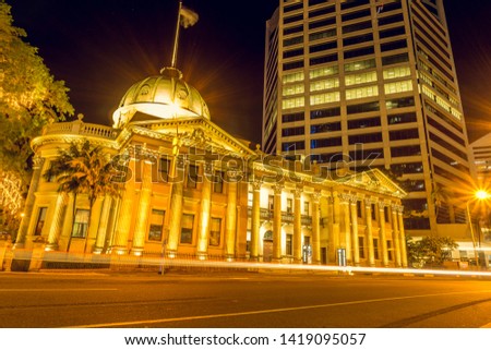 Illuminated Customs House in Brisbane, Queensland, Australia. This Heritage-listed government building was designed in Victorian Free Classical Style. Long Exposure Photography. High Resolution Image.