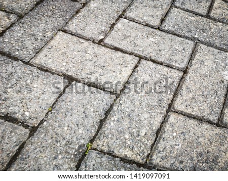 Driveway paving stones in a herringbone pattern - UK