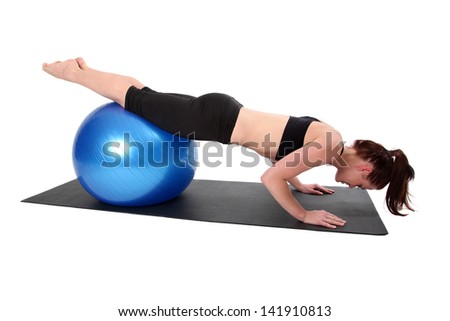 Young woman doing Pilates.  Isolated on a white background.