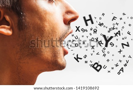 close up of a young man speaks - words power - watch your words concept Royalty-Free Stock Photo #1419108692
