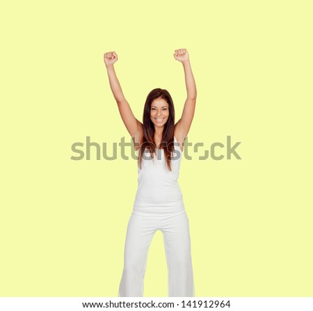 Attractive girl dressed in white on yellow background