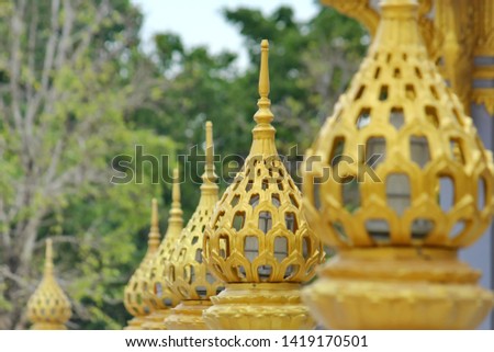 Thai stripes of a lotus lamp at Wat Sothornworamaskwiharn at Thailand 