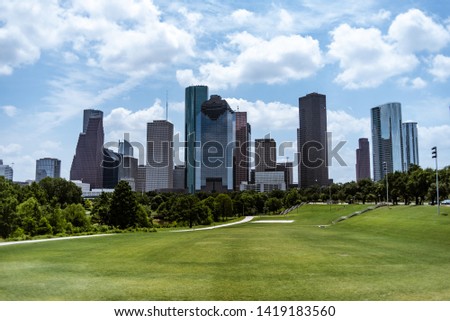 Downtown Houston Texas skyline, daytime, blue skies.