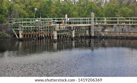 View Across Water to an Empty Dock