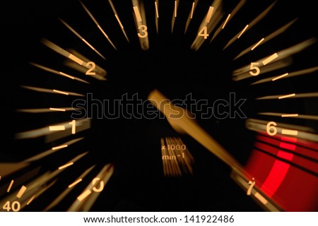 Tachometer at night Royalty-Free Stock Photo #141922486