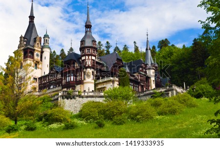 Castle in the woods. Peles Castle, summer residence of Romanian kings, is one of the most important historic edifices in Romania.
