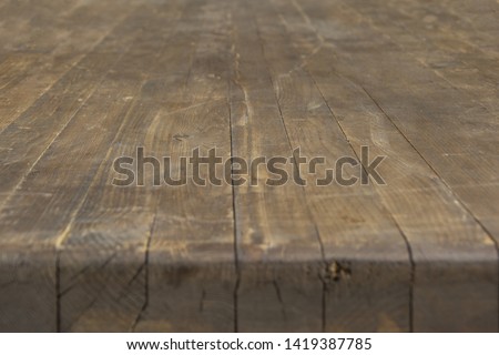 Wooden tabletop with a thick tabletop in perspective