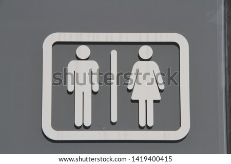 a sign for a public toilet