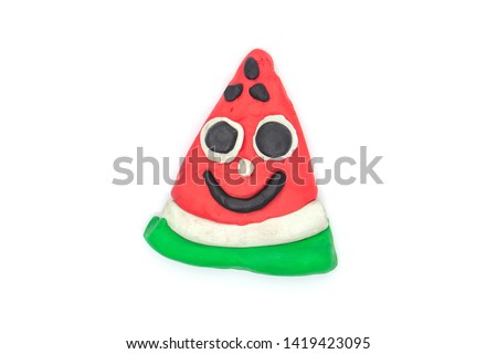 Play dough Watermelon fruit imitation on white background. Handmade clay plasticine
