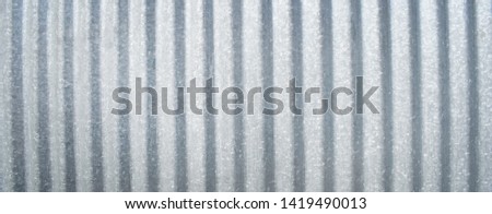 Galvanized sheet background. Old gray fence texture.