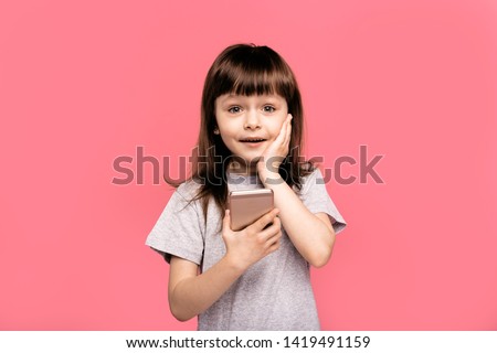 Close up photo cute funky kid astonished disappointed touch hand her face shout unbelievable unexpected terrified nervous stylish trendy beautiful colors isolated pink background