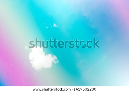 Abstract texture background of white clouds in heart shaped on colorful pastel or rainbow sky background, copy free space for text.  