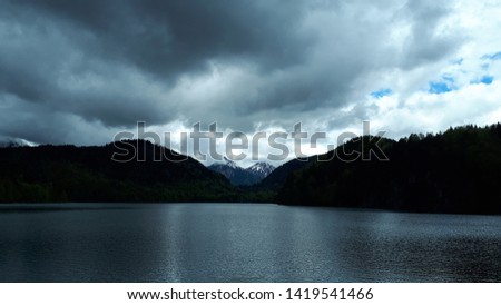 Beautiful Bavarian Alps landscape with lake and mountains.