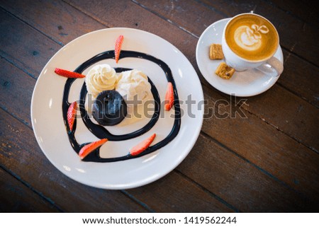 The picture of hot chocolate lava cake with hot latte coffee
