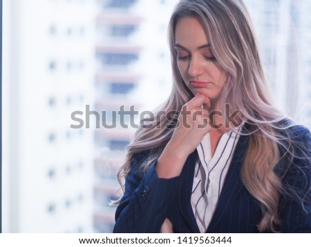 Portrait of Caucasian business woman posing in office, professional lady officer wear shirt and suit, smart stress thinking