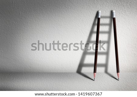 Stairs with pencil for effort and challenge in business to be achievement and successful concept. Royalty-Free Stock Photo #1419607367