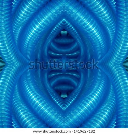 ribbed blue transparent flexible water hose into patterns by reflection