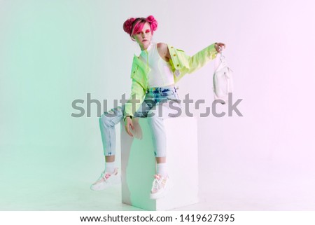 nineties style woman sitting on a cube place free