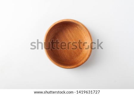 Isolated wooden bowl on white background Royalty-Free Stock Photo #1419631727