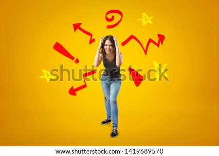 Young girl in casual clothes making brain explosion gesture with cartoon symbols, arrows and stars on yellow background. People and objects. Feelings and emotions. Digital art.