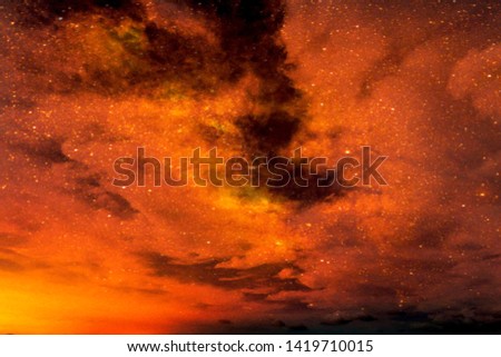 Realistic abstract nature texture of Moody and scary Dark clouds & stars in red & orange night sky space for background, backdrop, template & wallpaper. Mystery Planet, Universe & cosmology concept 
 Royalty-Free Stock Photo #1419710015