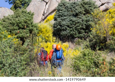 A couple of climbers go to practice climbing in Madrid.