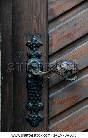 Door handle old iron with leaf design
