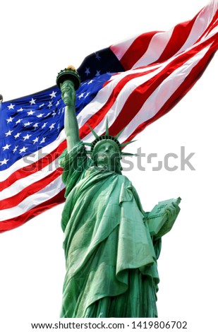 Statue of Liberty in New York City with the american flag