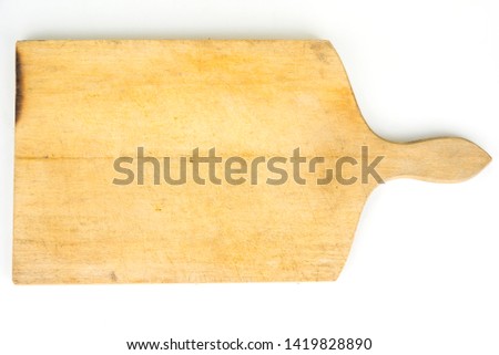 Old cutting board on a white background